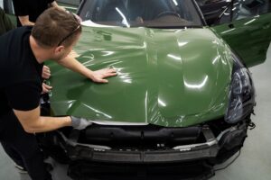 person-working-car-wrapping_23-2149342667